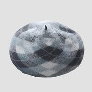 Gray and white argyle beret.