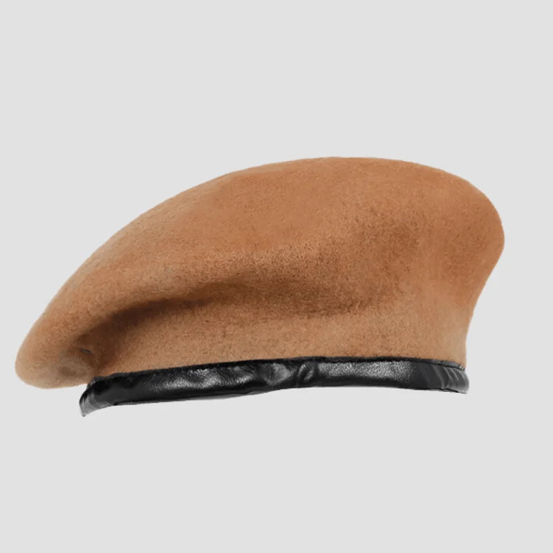 Tan wool beret with black trim.