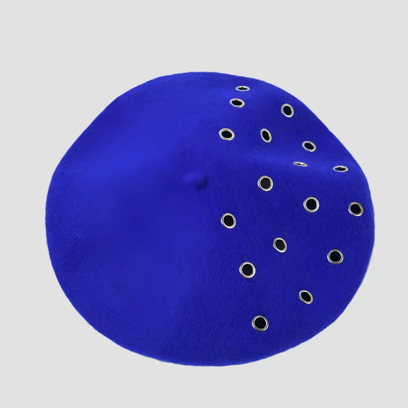 Blue beret with grommets.