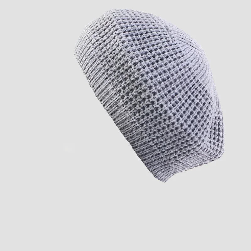 Gray knitted beret.
