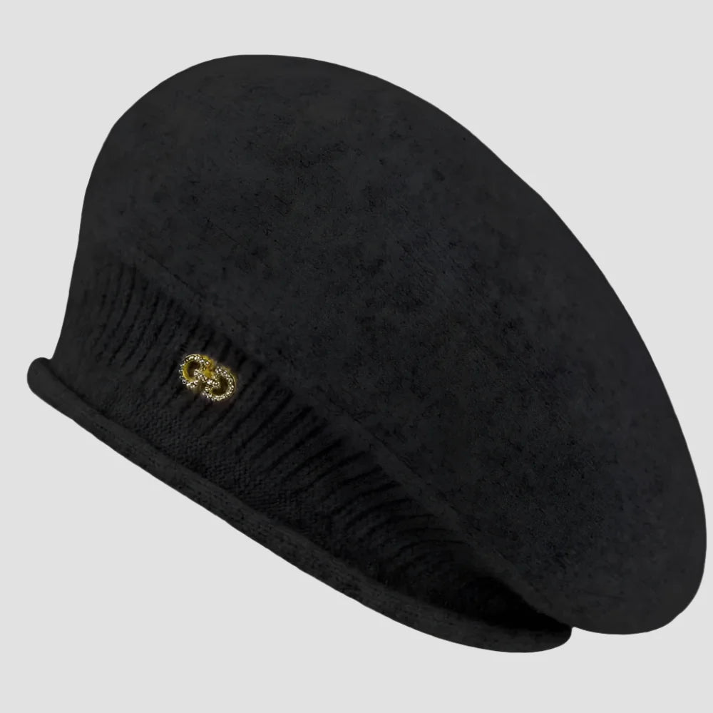 Black beret with gold embellishment.