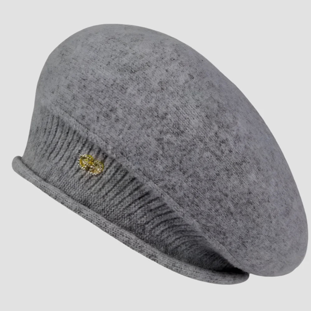 Gray knit beret with embellishment.