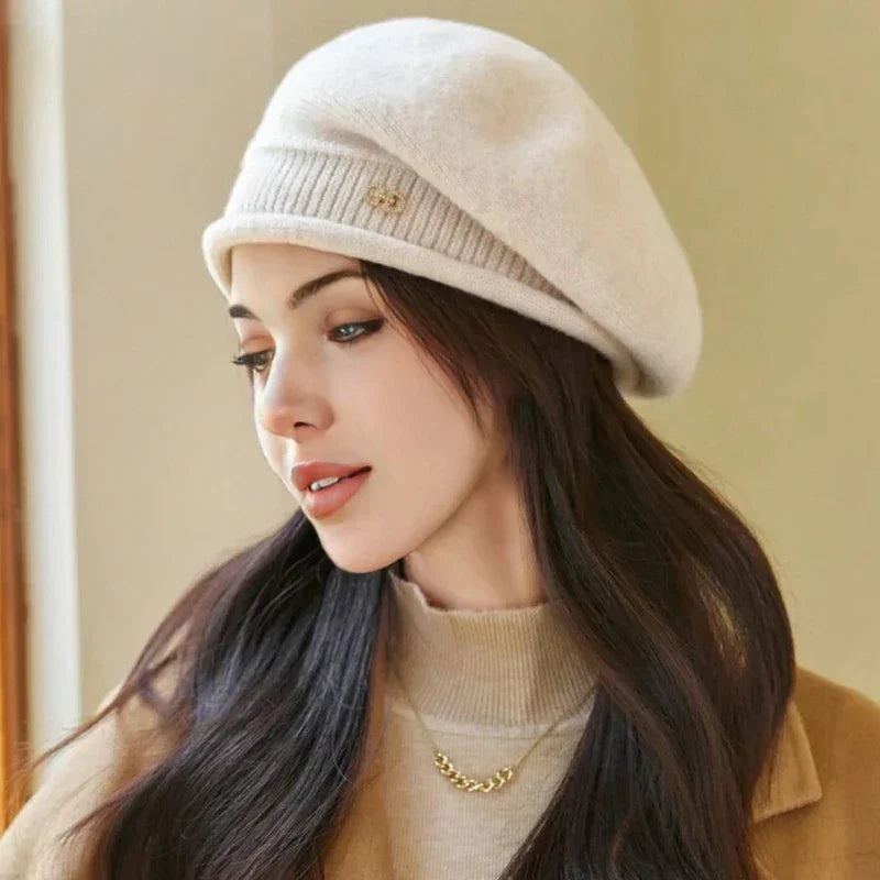 Woman wearing a white beret.