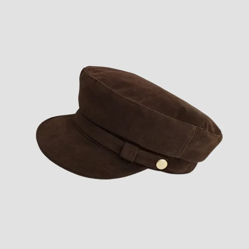 Brown suede-like cap with gold button.