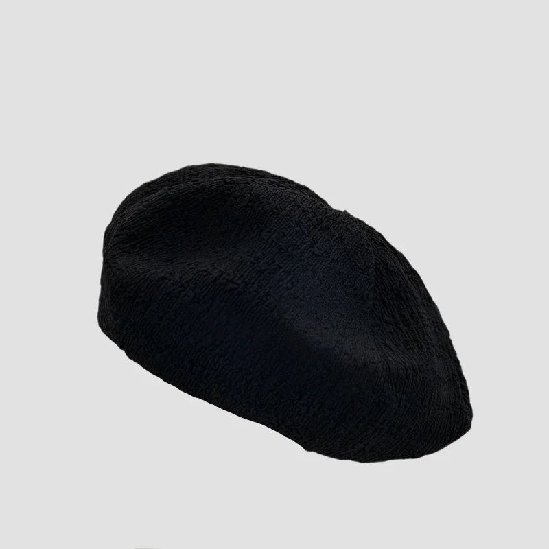Black textured beret.