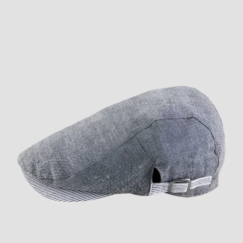 Gray newsboy cap.