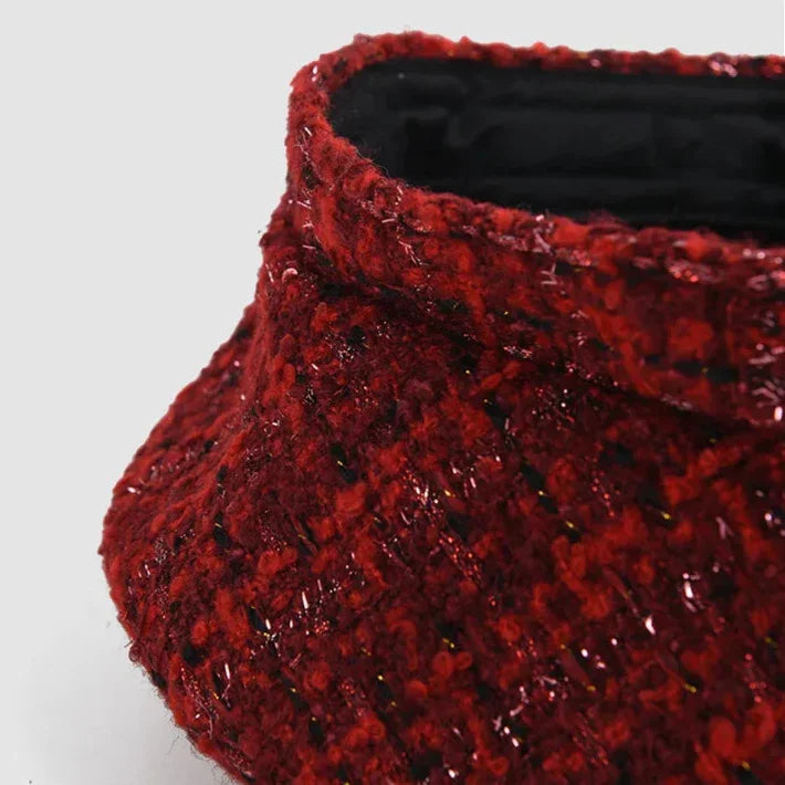 Red tweed handbag.