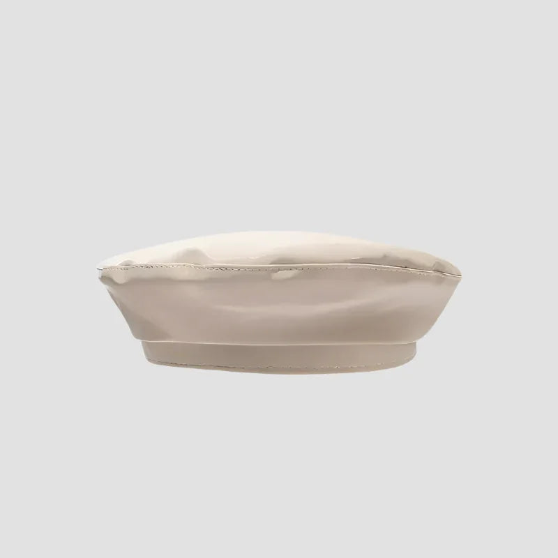 Beige beret.