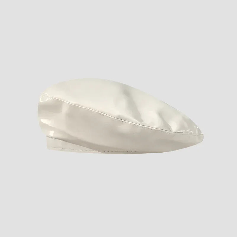 Cream-colored satin beret.
