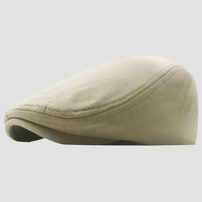 Beige flat cap.