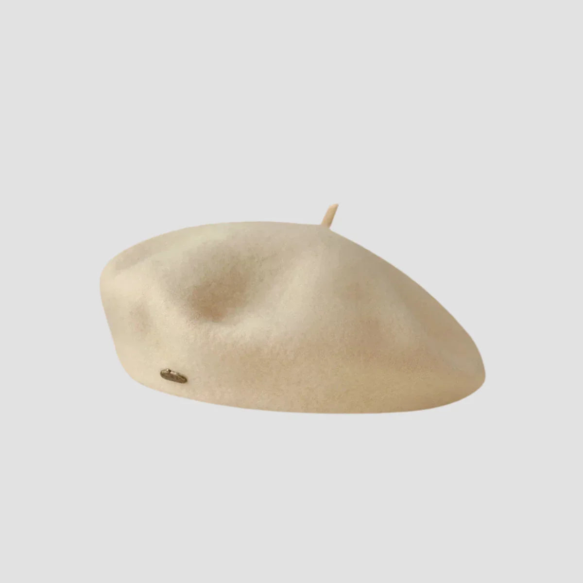Cream-colored wool beret.