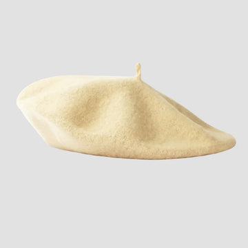 Cream-colored wool beret.