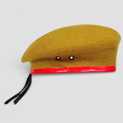 Mustard-yellow Army Ranger Beret with glossy red band and black tassels