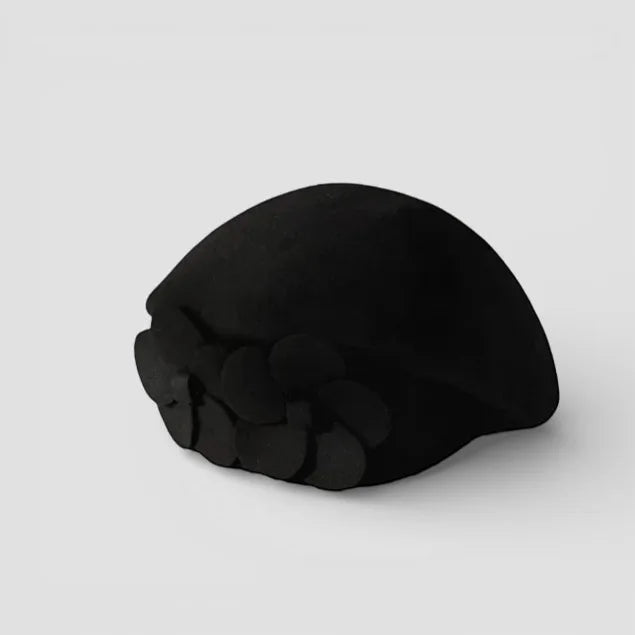 Black plush skull cushion on Audrey Wool Beret with textured edge