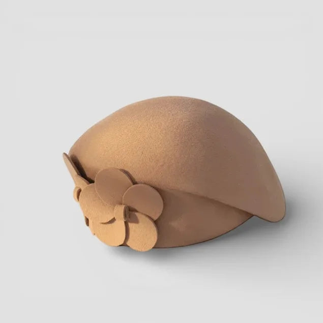 Tan felt cloche hat with layered floral embellishment on Audrey Wool Beret