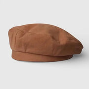 Authentic Basque Beret in soft tan textured fabric with subtle stitching