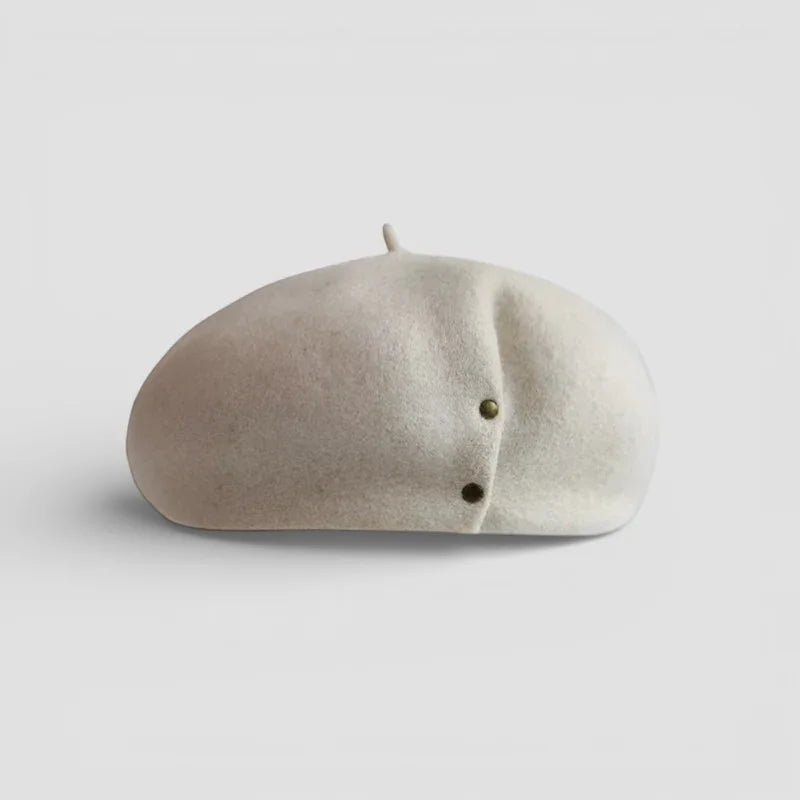 Basque Wool Beret: soft off-white felt with subtle texture and metallic buttons