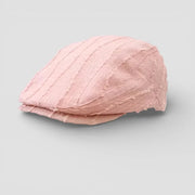 Soft pink textured Beanie Beret Cap with ribbed pattern and frayed edges