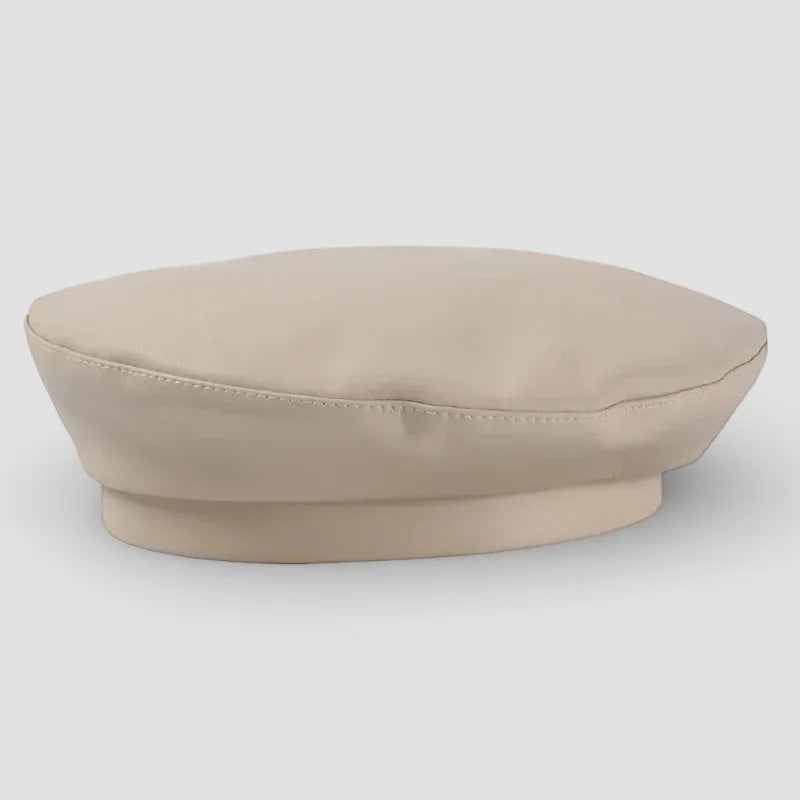 Beige leather beret with soft rounded crown and subtle stitching