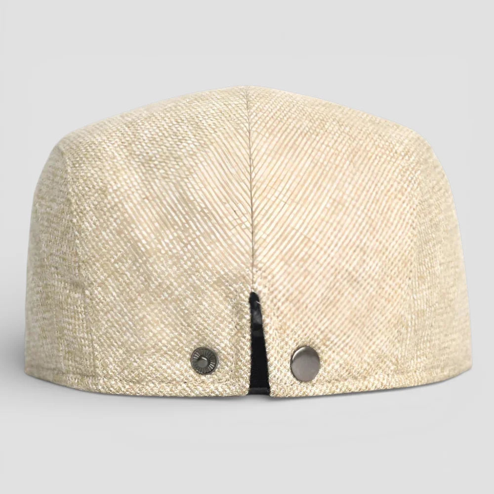 Back view of beige herringbone Beret Cap Adjustable with metallic snap buttons