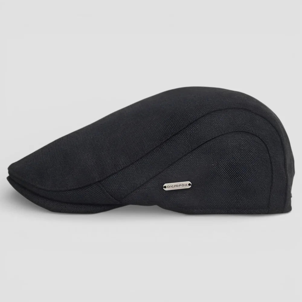 Black oxford fox flat cap with textured finish and stitching details