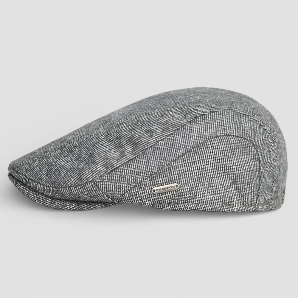 Gray herringbone flat cap with subtle texture, stitched seams, adjustable Beret Cap
