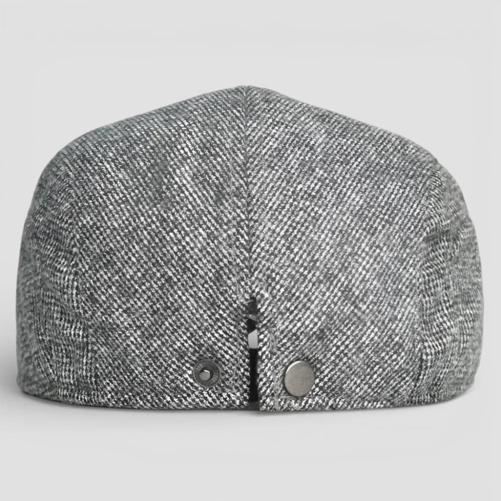 Back view of gray herringbone wool Beret Cap Adjustable with metallic snap buttons