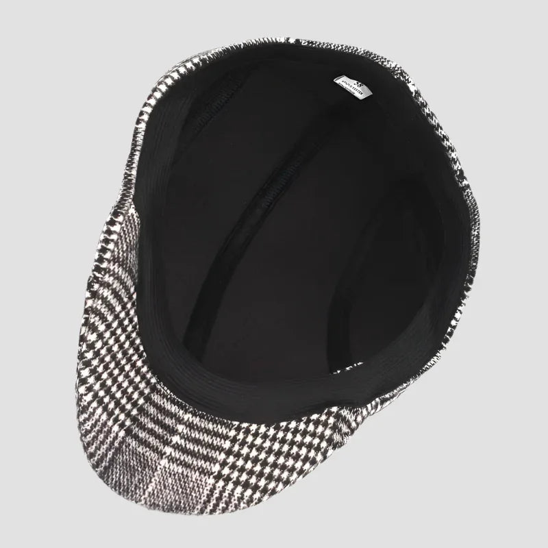 Houndstooth flat cap with black lining.