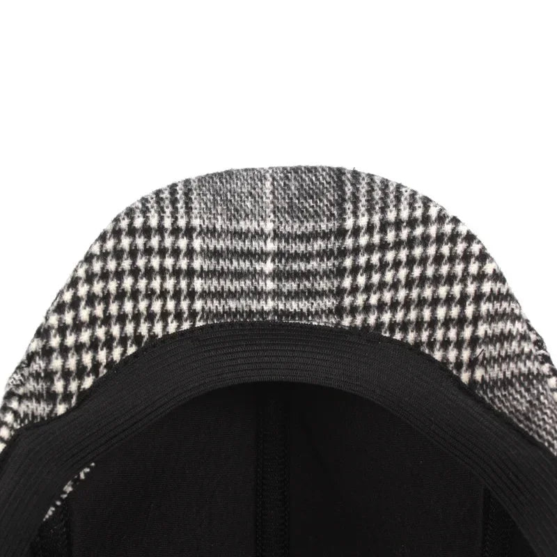 Houndstooth patterned cap.