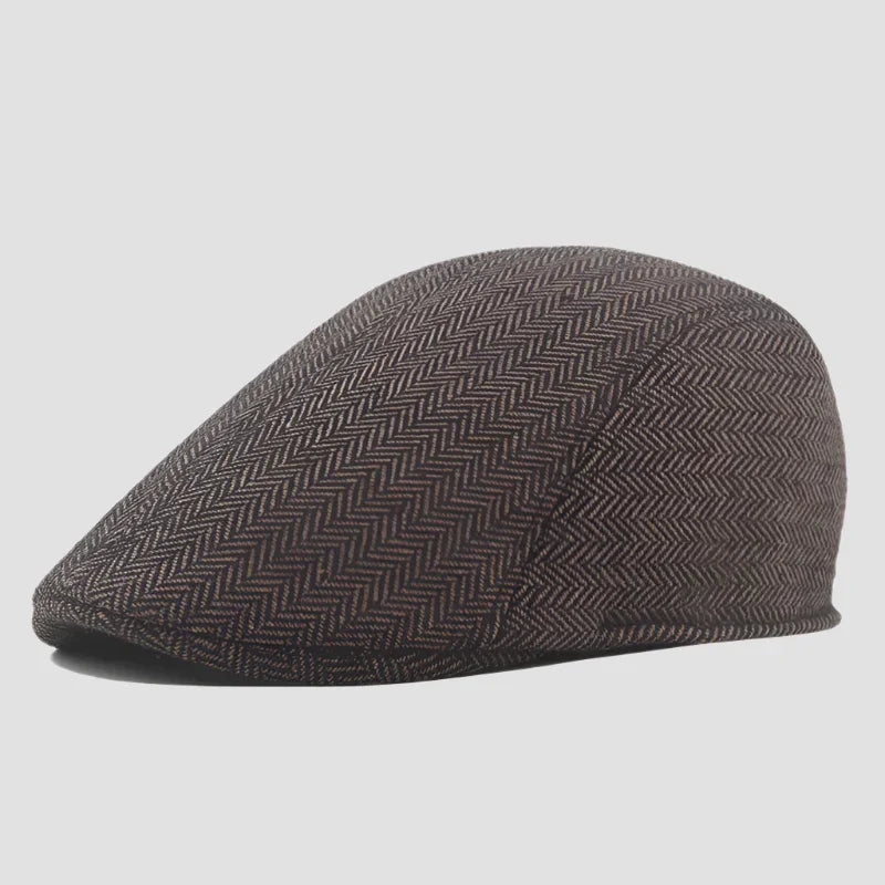 Brown herringbone flat cap.