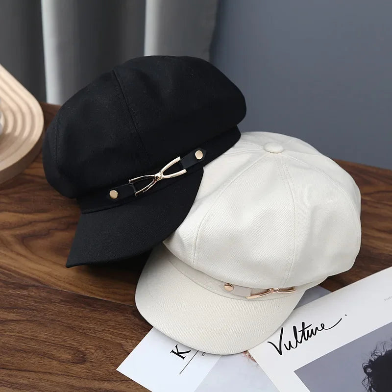 Two stylish newsboy caps.