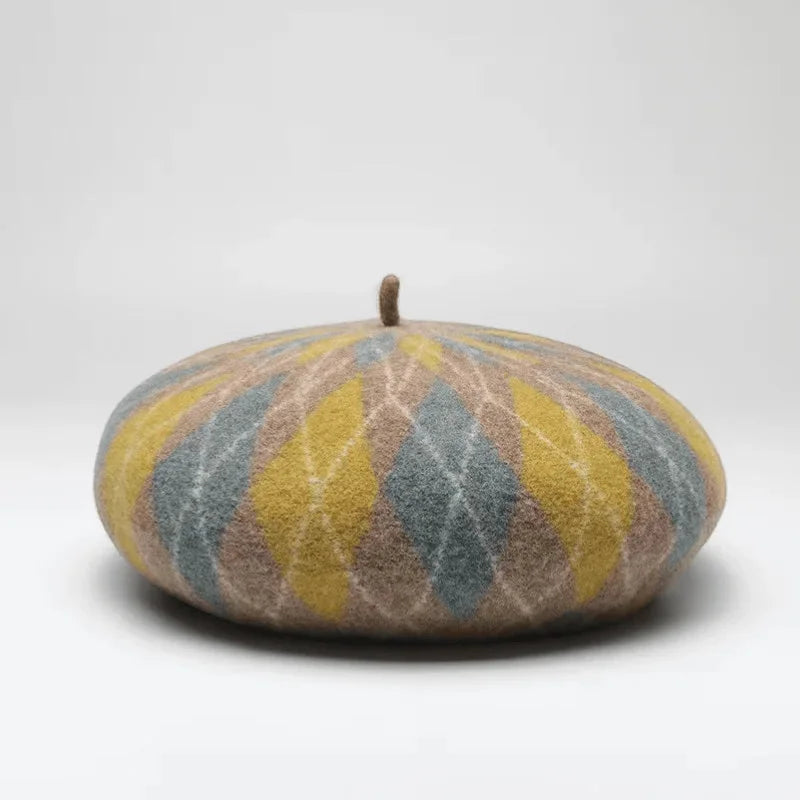 Beret Knit Pattern: mustard yellow and muted blue diamonds on beige felt