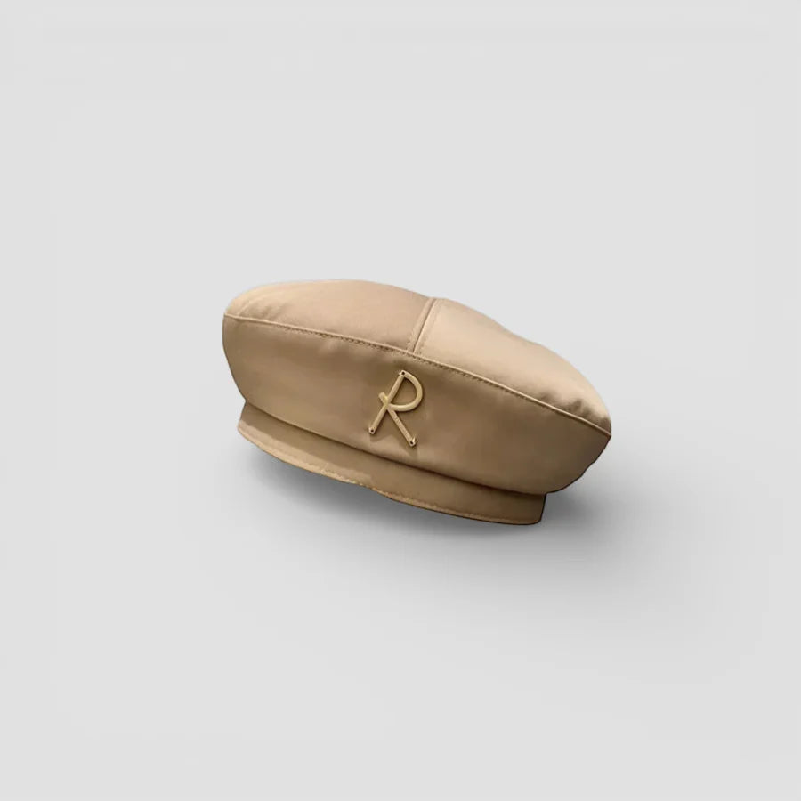 Beret R: beige satin beret with gold-toned embroidered r logo