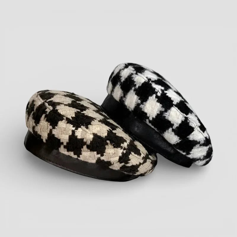 Black and white houndstooth beret with textured fabric finish
