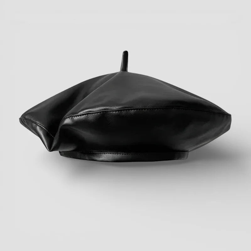 Black faux leather beret with glossy finish and central button