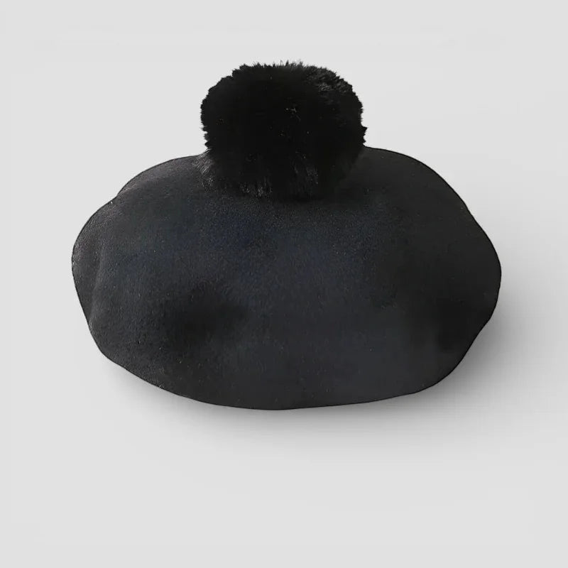 Black beret with fluffy black pom-pom on top
