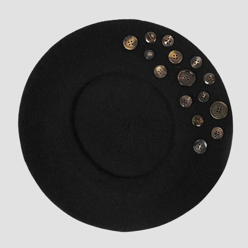 Black beret with buttons.