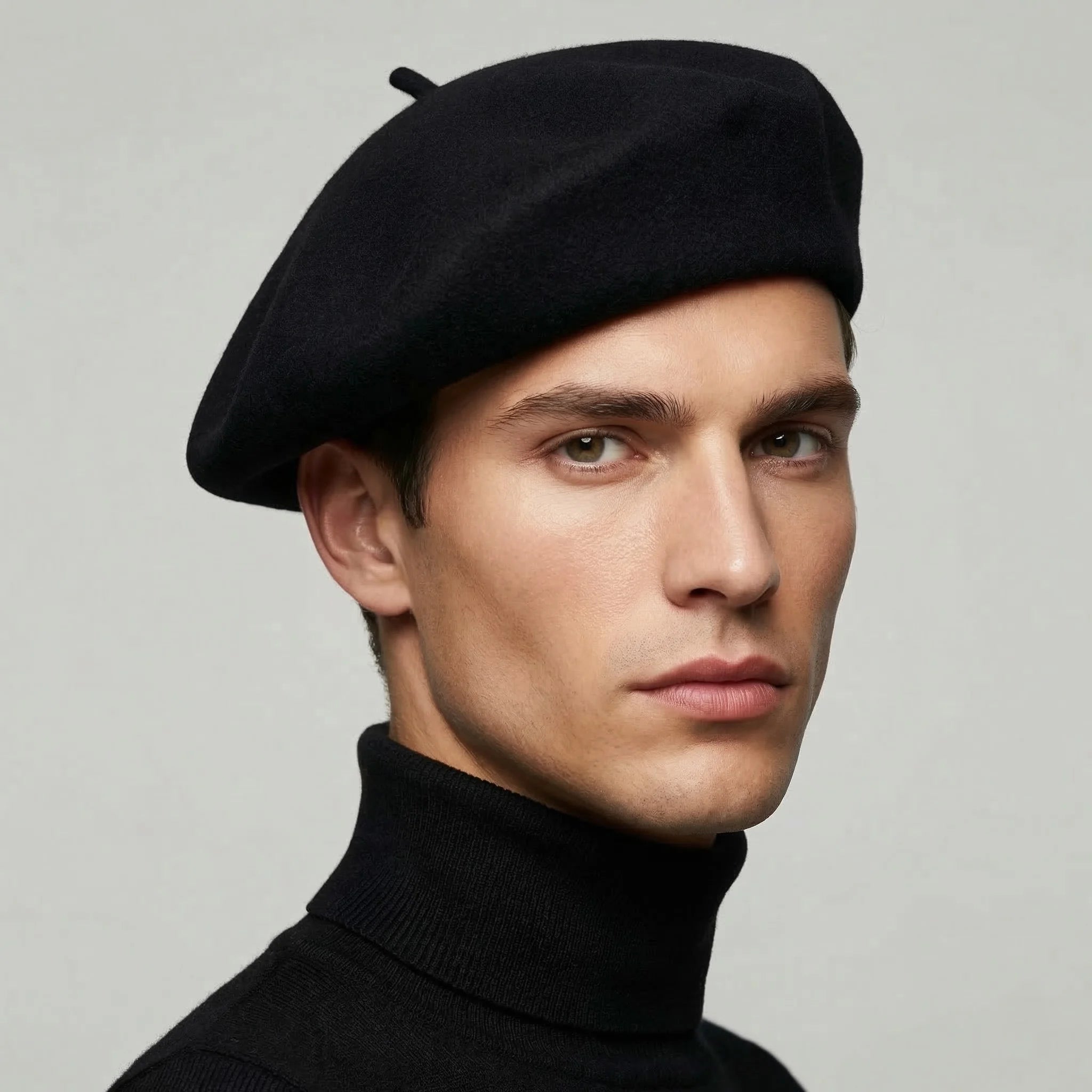 Black French beret in wool with small top button