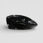 Black glossy patent leather beret with stitched detailing