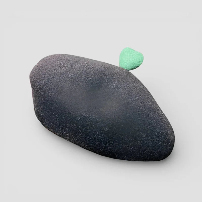Matte black oval Black Heart Beret stone with mint-green heart accent
