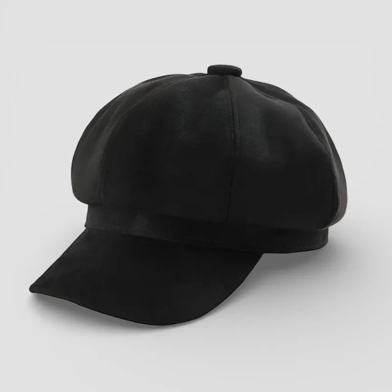 Black newsboy cap with structured crown and flat brim