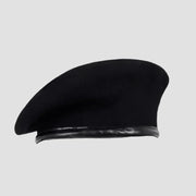 Black beret.