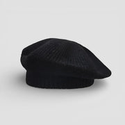 Black wool French beret with soft textured fabric and ribbed crown