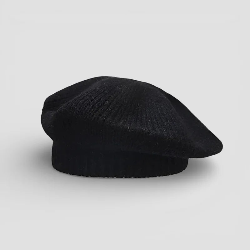 Black wool French beret with soft textured fabric and ribbed crown