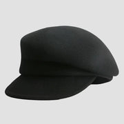 Black peaked cap.