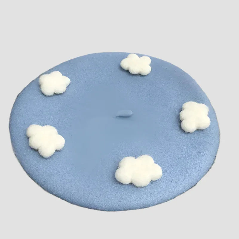 Blue beret with white clouds.