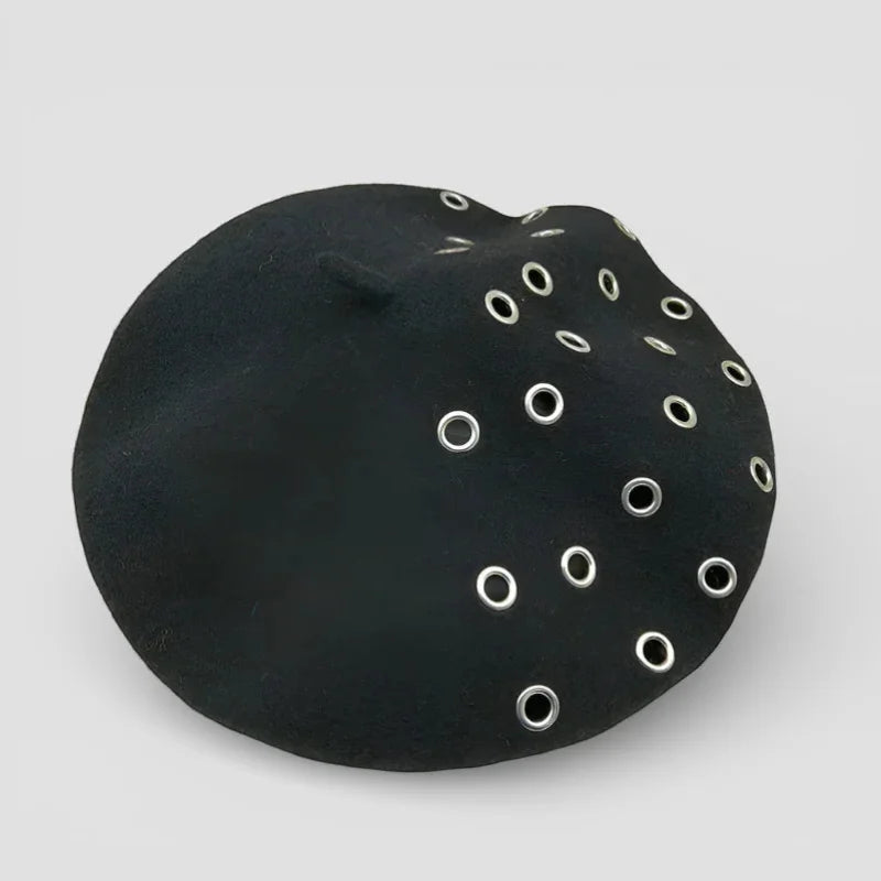 Black suede-like Boina Hat brooch with silver-toned grommets
