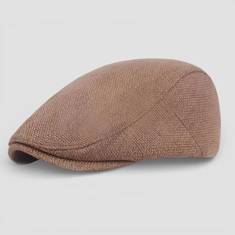 Brown flat cap beret with tan textured weave and stitched seams
