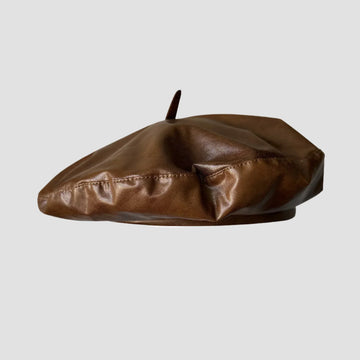 Brown leather beret.