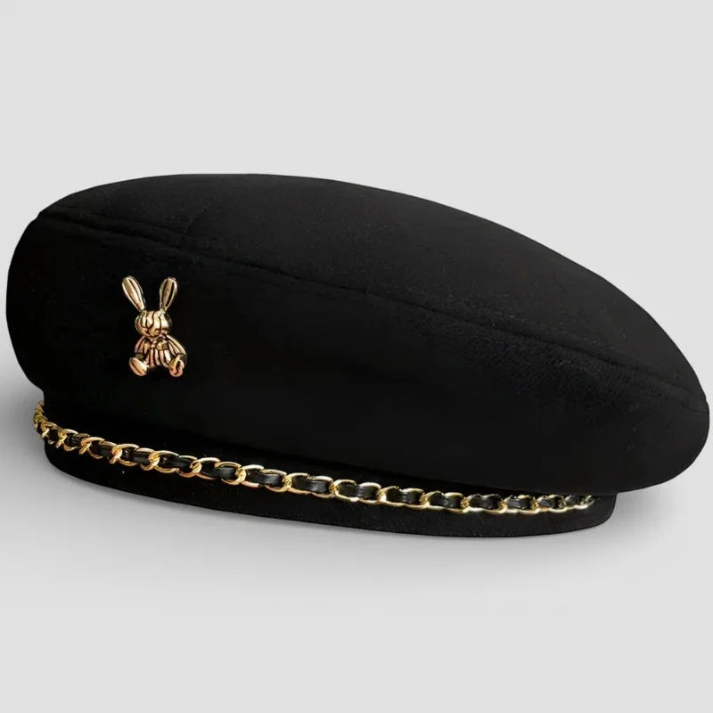 Bunny Beret: black felt beret with gold bunny pin and chain trim